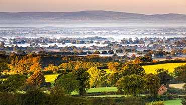 Autumn mists on the Cheshire plain extending across the landscape to the Welsh hills, Cheshire, England, United Kingdom, Europe