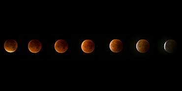 Lunar eclipse, a rare supermoon, blood moon composite phase in the night sky, United Kingdom, Europe