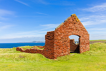 Red brick buildings, ruins of the industrial quarrying activity near to Porthgain harbour, Pembrokeshire, Wales, United Kingdom, Europe