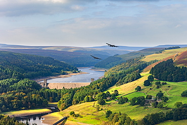 Upper Derwent Valley with two Lancaster bombers passing the Derwent Dam in the style of 617 Squadron Dambusters, Peak District, Derbyshire, England, United Kingdom, Europe