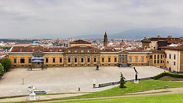 Looking to the west wing of the Palazzo Pitti and beyond to the centre of Florence from the Boboli Gardens, Florence, Tuscany, Italy, Europe