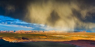 Storm passes across Navajo Mountain just before sunset, Page, Arizona, United States of America, North America