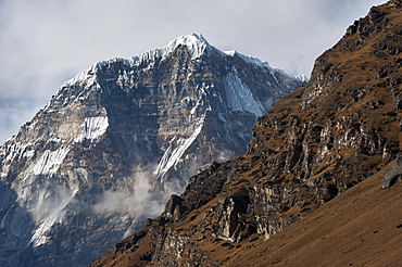 The looming face of Jomolhari, the third highest mountain in Bhutan at 7326m, seen from Jangothang, Bhutan, Himalayas, Asia