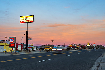 Historic Route 66 town glowing at sunset, Seligman, Arizona, United States of America, North America