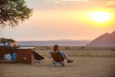 Sunset on the edge of the Namib Desert at the Namib Desert Lodge, Namibia, Africa