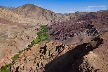 Rugged landscapes and green patchwork fields near Shahr-e Zohak, Afghanistan, Asia