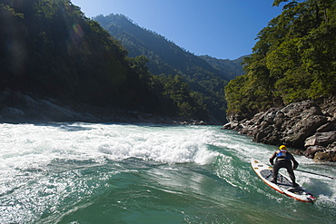 Stand Up Paddleboarding on the Karnali River, Nepal, Asia