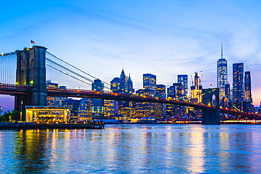 Brooklyn Bridge and Manhattan skyline at sunset, New York City, New York, United States of America, North America