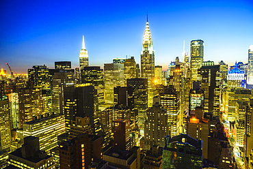 The Empire State and Chrysler buildings, Manhattan skyline at dusk, New York City, United States of America, North America