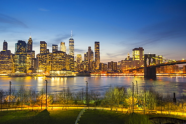 Manhattan skyline and Brooklyn Bridge at dusk, New York City, United States of America, North America