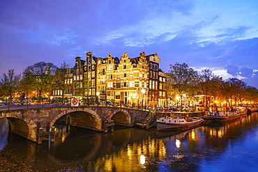 Canal scene at night, Amsterdam, Netherlands, Europe