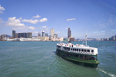 Star Ferry sailing towards the Kowloon side of Victoria Harbour, Hong Kong, China, Asia