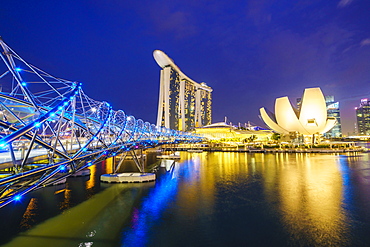 Helix Bridge, Marina Bay Sands and ArtScience Museum illuminated at night, Marina Bay, Singapore, Southeast Asia, Asia