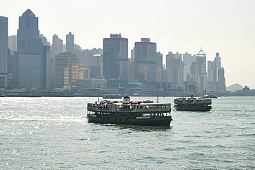 Star Ferry crossing Victoria Harbour from Hong Kong Island to Kowloon, Hong Kong, China, Asia