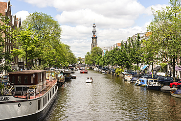 Prinsengracht canal looking towards Westerkerk church, Amsterdam, North Holland, The Netherlands, Europe