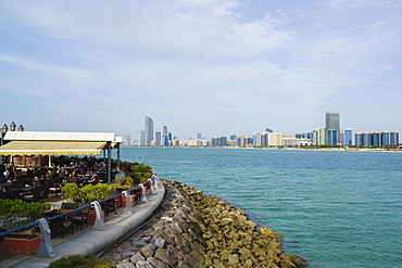 Restaurant overlooking the skyline across the Gulf, Abu Dhabi, United Arab Emirates, Middle East