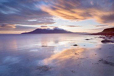 Sun setting over the Isle of Rum, Inner Isles, Inner Hebrides, Highlands, Scotland, United Kingdom, Europe