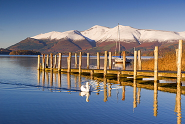 Derwent Water and snow capped Skiddaw from Lodor Hotel Jetty, Borrowdale, Lake District National Park, Cumbria, England, United Kingdom, Europe