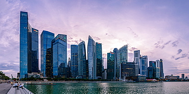 Skyscrapes line Marina Bay at dusk, Singapore, Southeast Asia, Asia