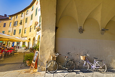 Parked bicycles at Piazza dell Anfitreatro, Lucca, Tuscany, Italy, Europe