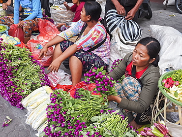 Flower sellers at a market, Denpasar, Bali, Indonesia, Southeast Asia, Asia