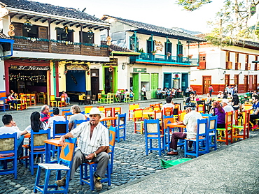 Patrons relax at cafe tables, Parque Principal, Jardin, Antioquia, Colombia, South America