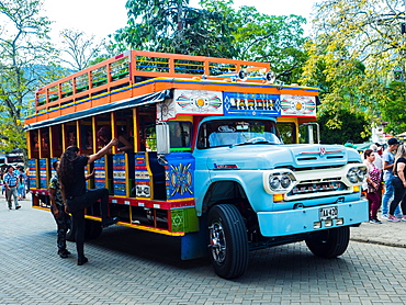 Brightly painted chivas, common transport in rural Antioquia, Jardin, Antioquia, Colombia, South America