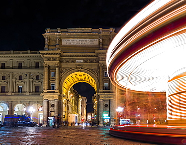 Long exposure of carousel at night in Florence, Tuscany, Italy, Europe