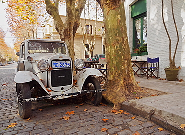 Vintage car on a cobblestone lane of the historic quarter, Colonia del Sacramento, Colonia Department, Uruguay, South America