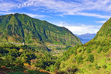 A distant view of Tower Chapel, Capela de Nossa Senhora de Fatima, looking towards Sao Vicente and the Atlantic Ocean, Madeira, Portugal, Atlantic, Europe