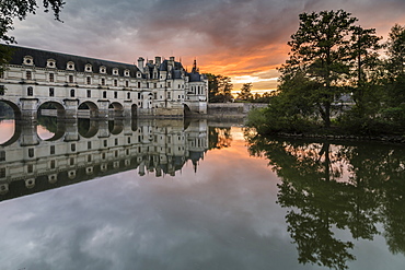 Chenonceau castle reflected in the Loire at sunset, UNESCO World Heritage Site, Chenonceaux, Indre-et-Loire, Centre, France, Europe