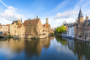 Houses and belfry reflected in the Dijver canal, Bruges, West Flanders province, Flemish region, Belgium, Europe