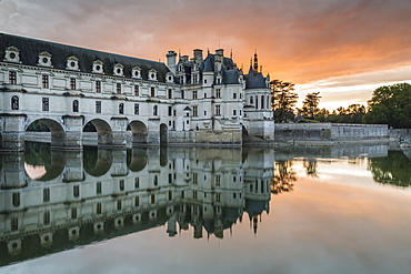 Chenonceau castle reflected on the Loire at sunset, Chenonceaux, Indre-et-Loire, Loire Valley, Centre, France, Europe