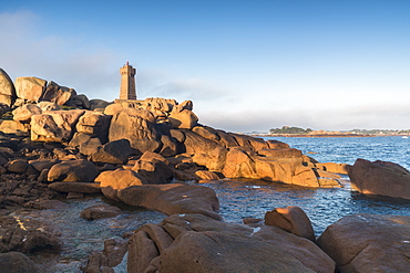 Morning light on Ploumanach lighthouse, Perros-Guirec, Cotes-d'Armor, Brittany, France, Europe