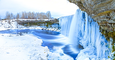 Winter ice covered and snowy waterfall, Estonia, Europe