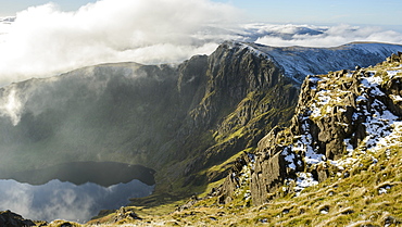 Craig Cau photographed from the peak of Cadair Idris, Snowdonia, during a cloud inversion in winter, Wales, United Kingdom, Europe