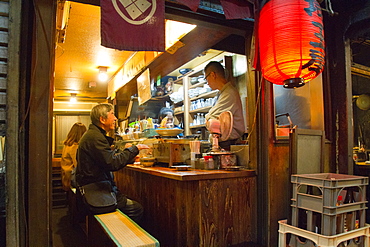 A yakatori (grilled bamboo skewered meat) restaurant of Shinjunku, Tokyo, Japan, Asia