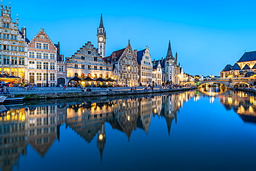 Graslei Quay in the historic city center of Ghent, mirrored in the River Lys during blue hour, Ghent, Belgium, Europe