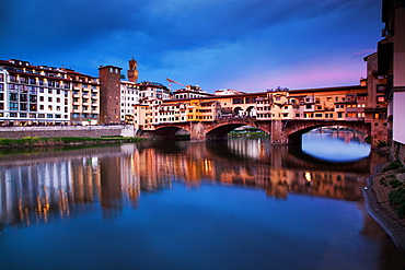 Ponte Vecchio at night reflected in the River Arno, Florence, UNESCO World Heritage Site, Tuscany, Italy, Europe