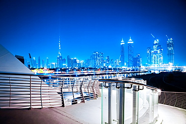 Dubai Downtown skyscrapers at night from Tolerance Bridge, Dubai, United Arab Emirates, Middle East