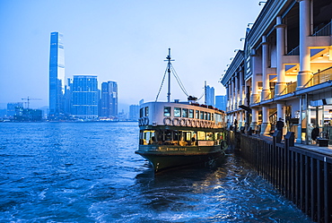 Star Ferry leaving Hong Kong Island, towards Kowloon at night, Hong Kong, China, Asia