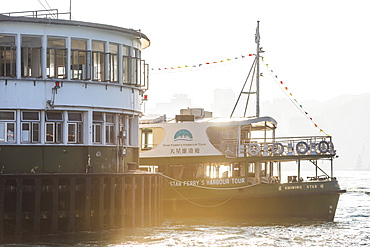 Star Ferry at sunset, between Hong Kong Island and Kowloon, Hong Kong, China, Asia