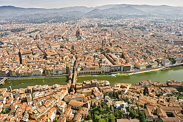 Aerial view of Florence with in the foreground Ponte Vecchio, Palazzo Vecchio and Cattedrale di Santa Maria del Fiore, Florence, Tuscany, Italy, Europe