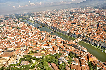 Aerial view of Florence with in the foreground Ponte Vecchio, Palazzo Vecchio and Cattedrale di Santa Maria del Fiore, Florence, Tuscany, Italy, Europe