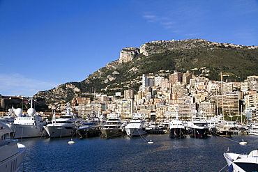 View of the harbour of Monaco Ville (Porte Hercule) with its luxury ships, Monaco, French Riviera, Mediterranean, Europe