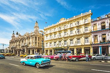 Colourful old American taxi cars outside the Gran Teatro de La Habana, Havana, Cuba, West Indies, Caribbean, Central America