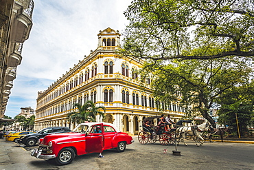 Vintage taxi car parked next to Escuela National de Ballet in La Habana (Havana), Cuba, West Indies, Caribbean, Central America