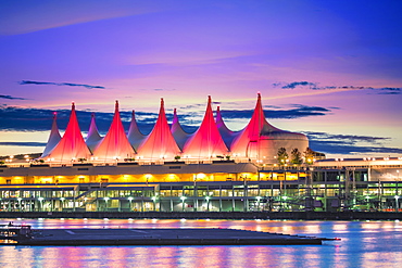 Canada Place at sunset on the Burrard Inlet waterfront of Vancouver, British Columbia, Canada, North America