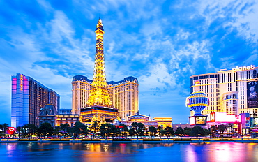 View of Eifel Tower of the Paris Hotel and Casino, The Strip at dusk, Las Vegas Boulevard, Las Vegas, Nevada, United States of America, North America