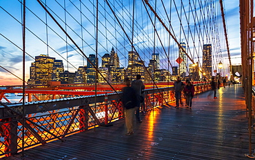 Manhattan skyline from the Brooklyn Bridge at night, New York, United States of America, North America